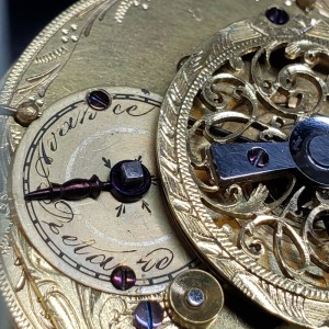 Close-up of the handmade decorative regulator hand on a 19th century French verge watch